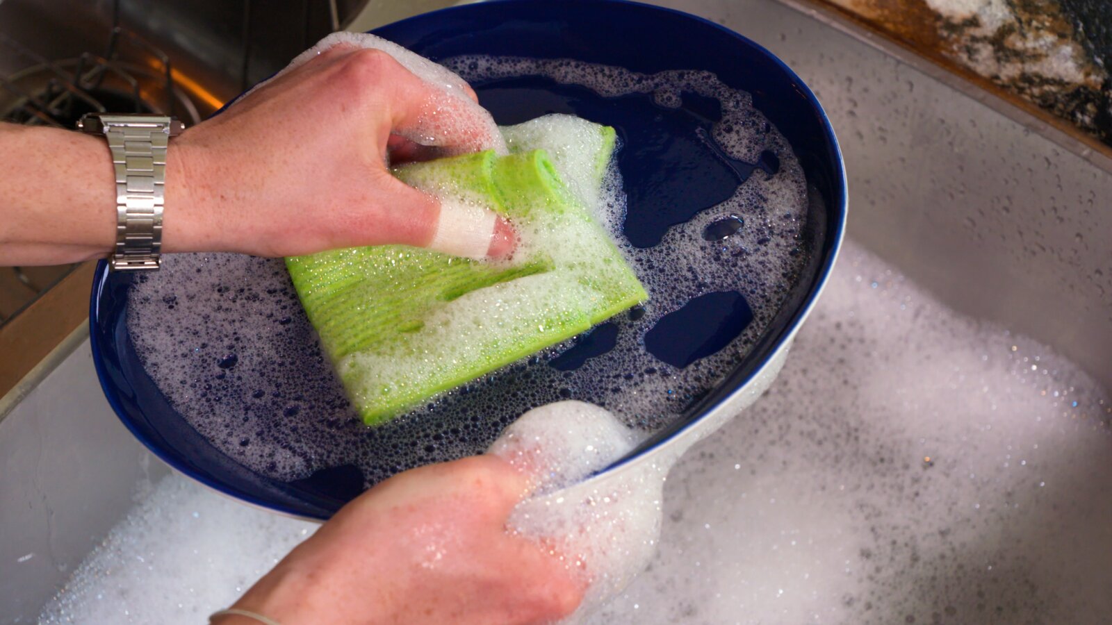 Washing dishes with finger tape - waterproof protection
