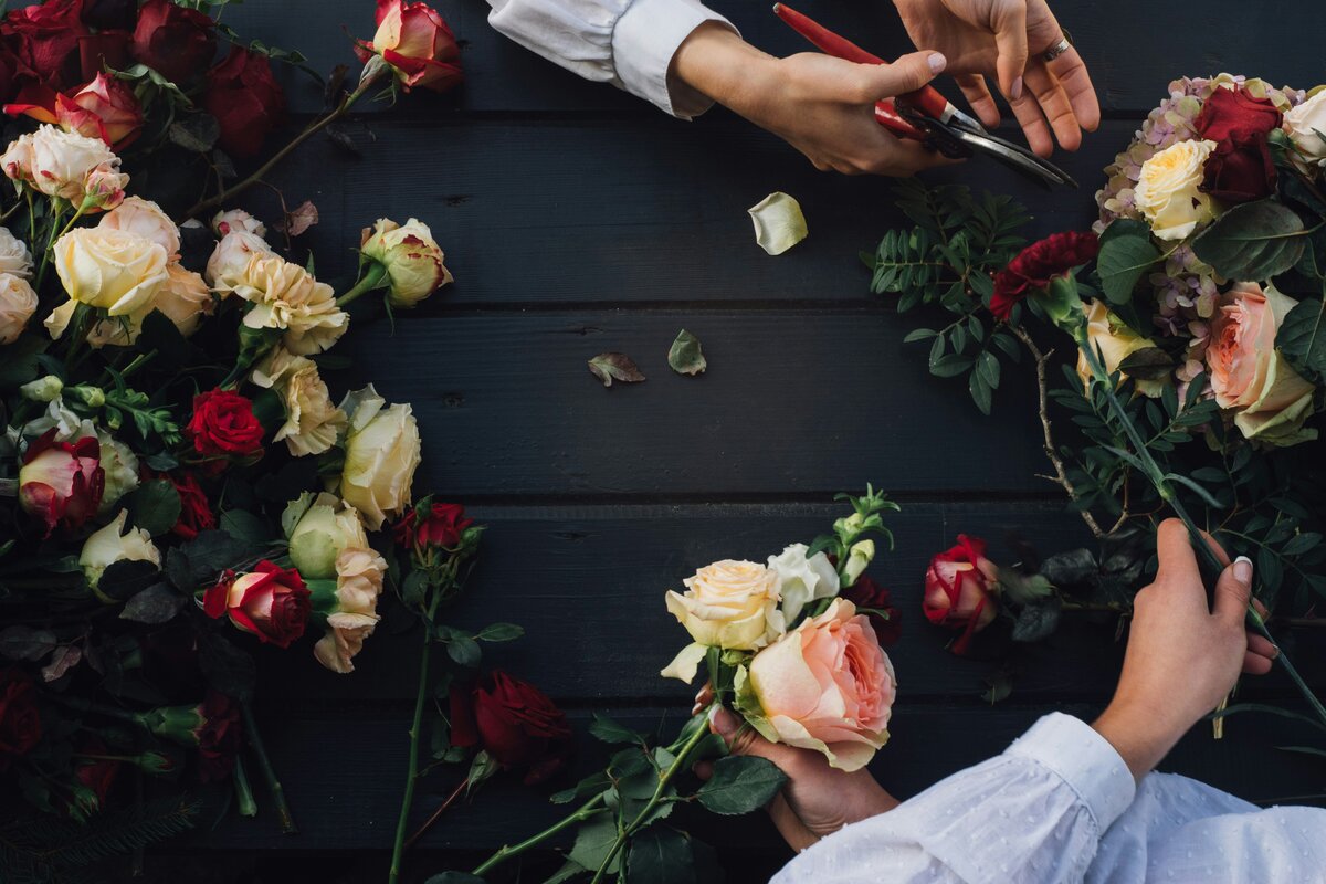 Florist arranging roses