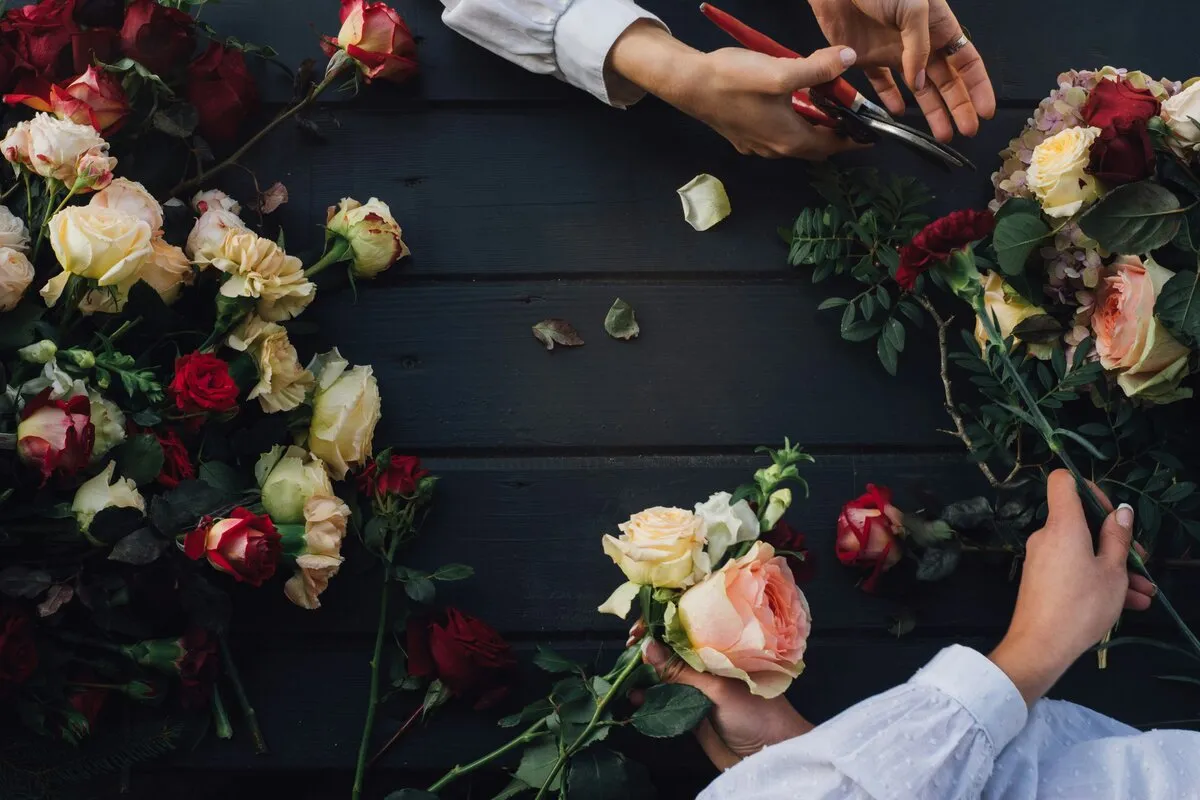Florist arranging roses