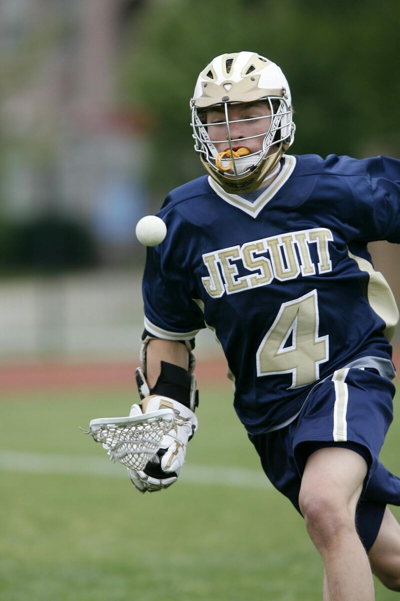 Lacrosse player with stick